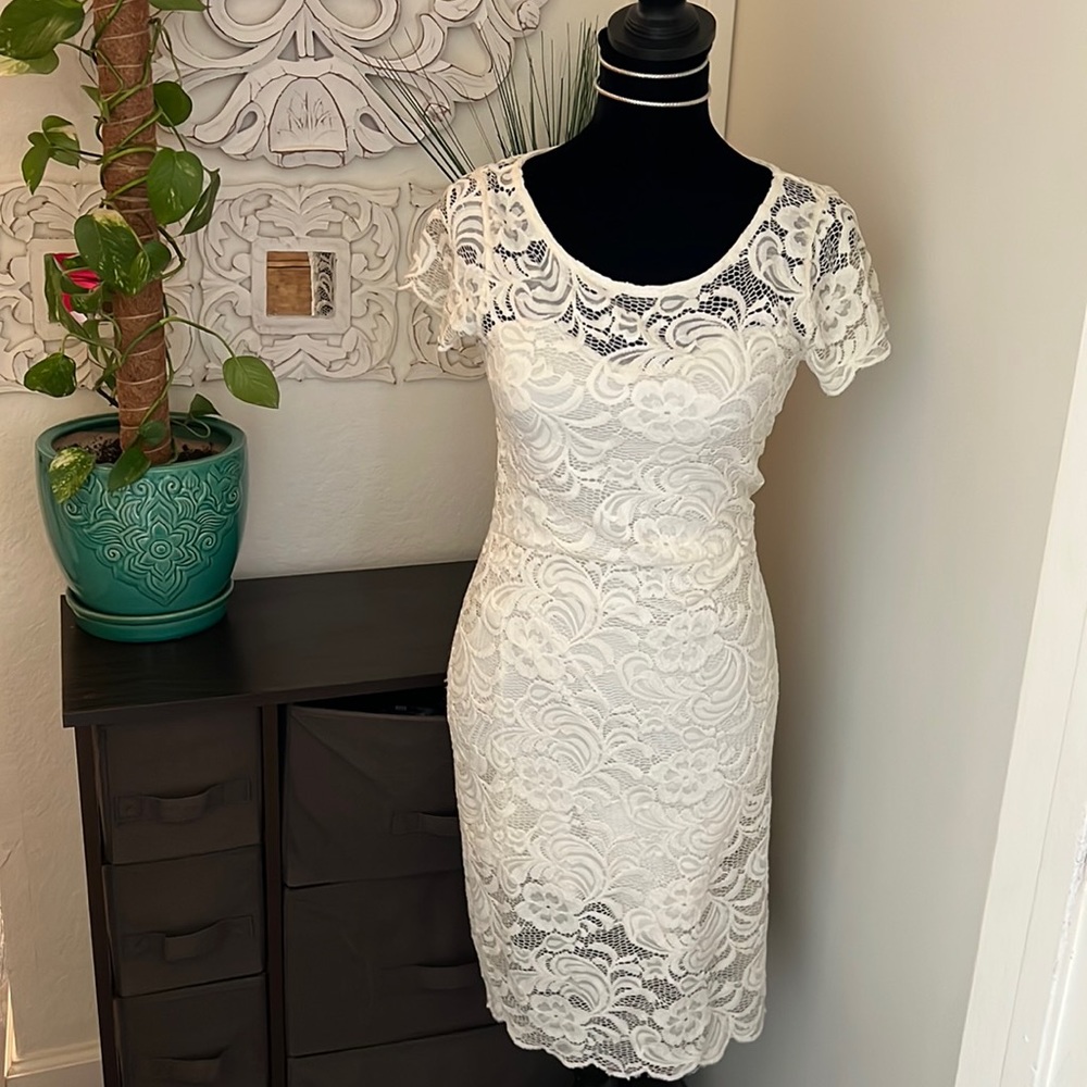 stunning cream lace dress.